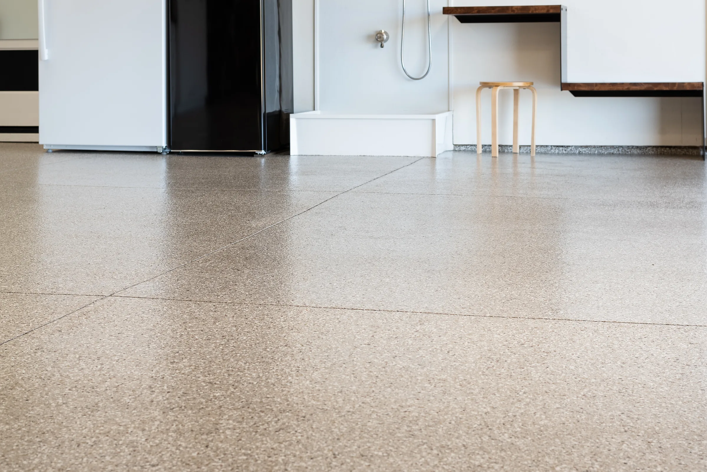 Blue and silver decorative chip polyurea garage floor