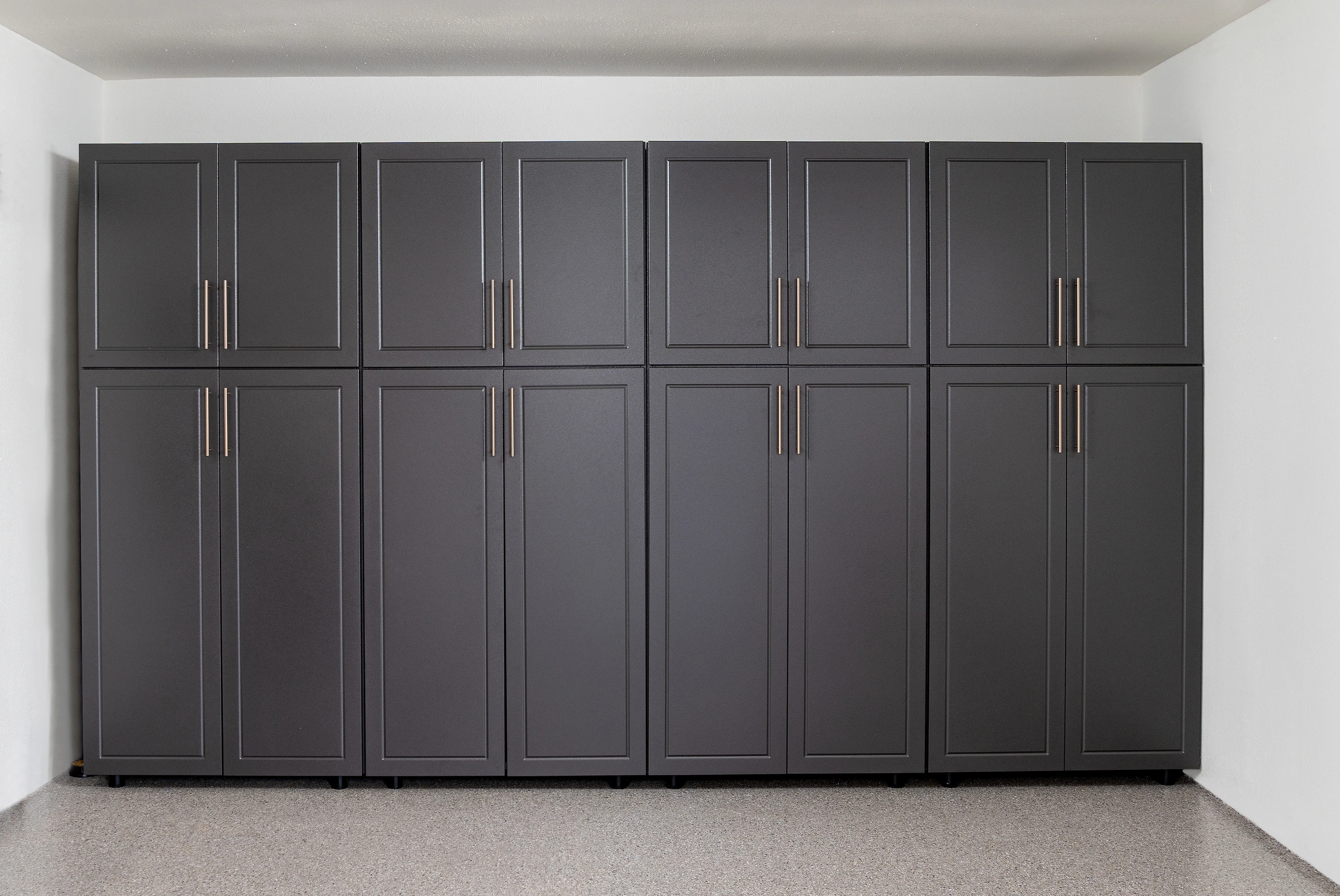 Blue powder-coated garage cabinet installation