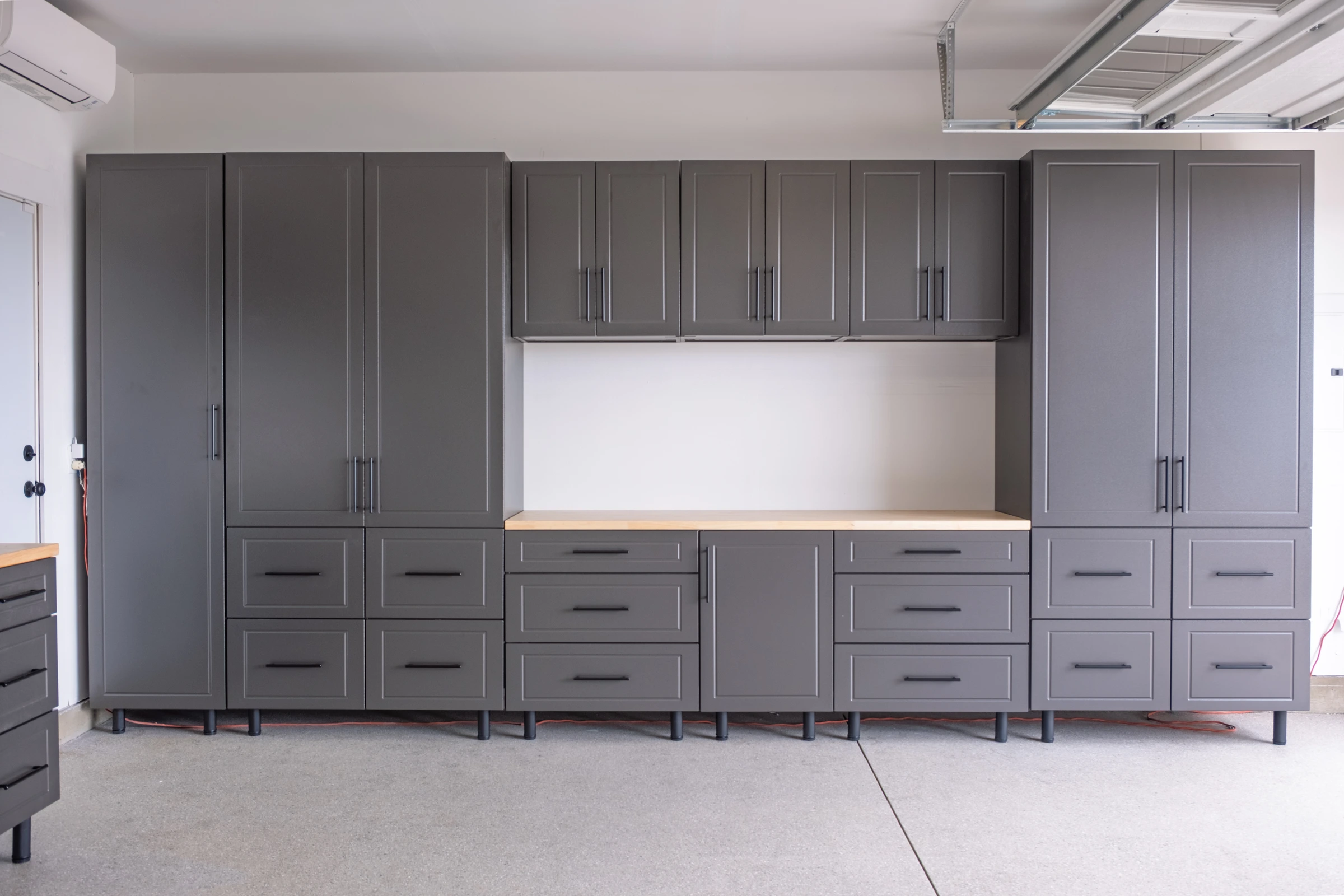 Full-wall garage cabinet installation