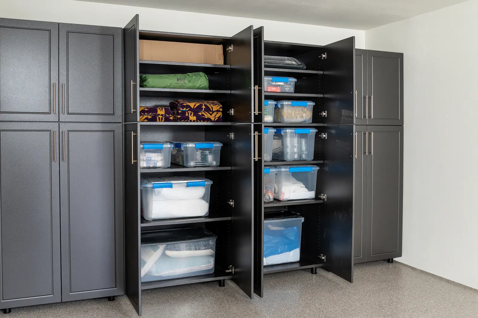 Blue powder coated garage cabinets