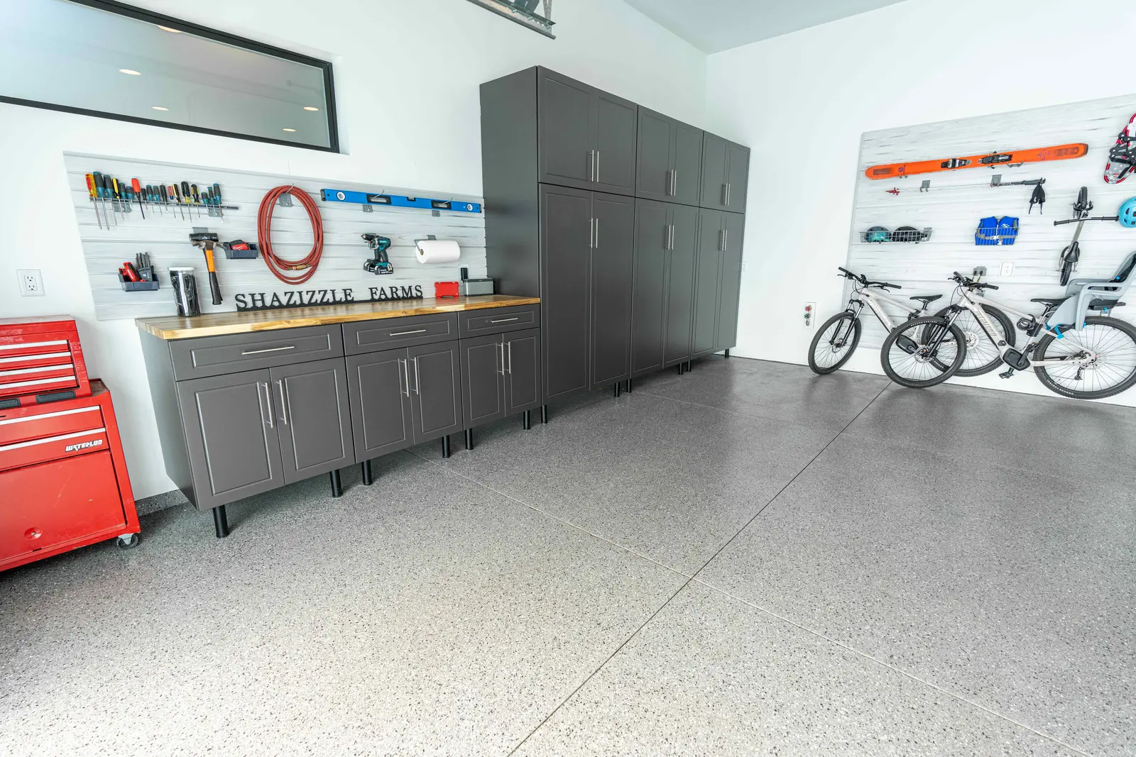 Wagner dream garage with custom storage and slat wall